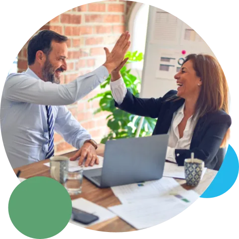 Colleagues celebrating with a high five